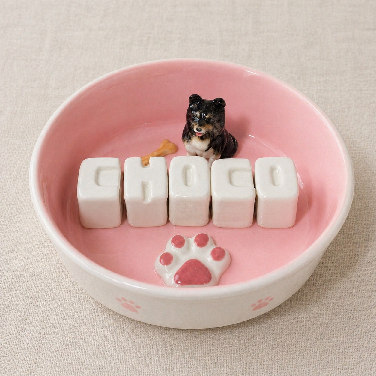 Product image of a custom name dog bowl with a personalized pet photo and ceramic feeding design.