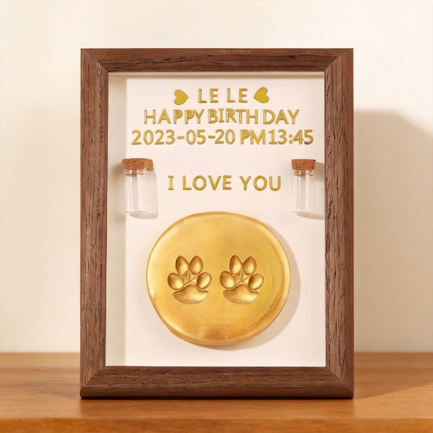 Product image of a personalized pet paw print frame for a dog's or cat's remembrance display.
