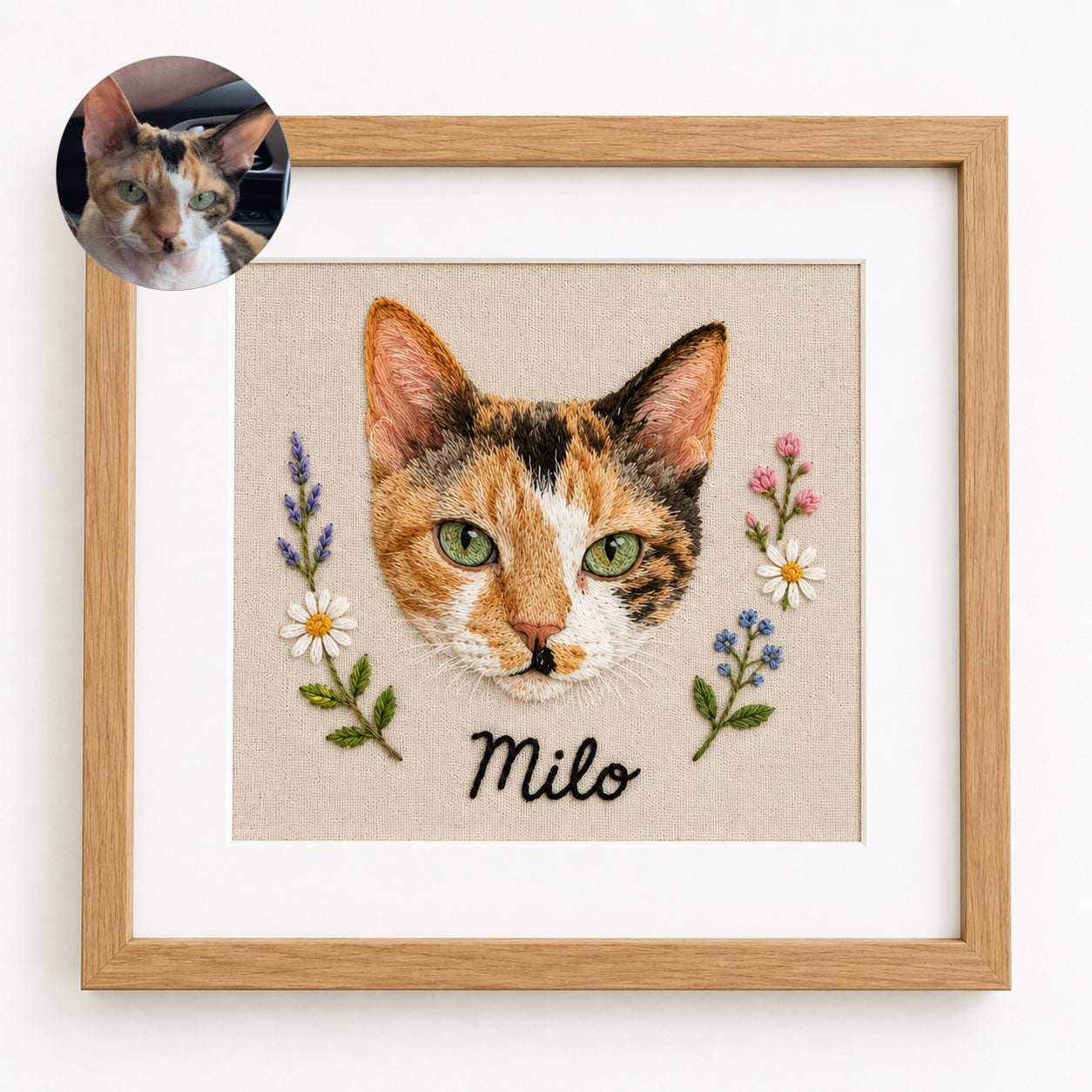 Product image of a square custom pet embroidery frame with a personalized pet portrait and name.