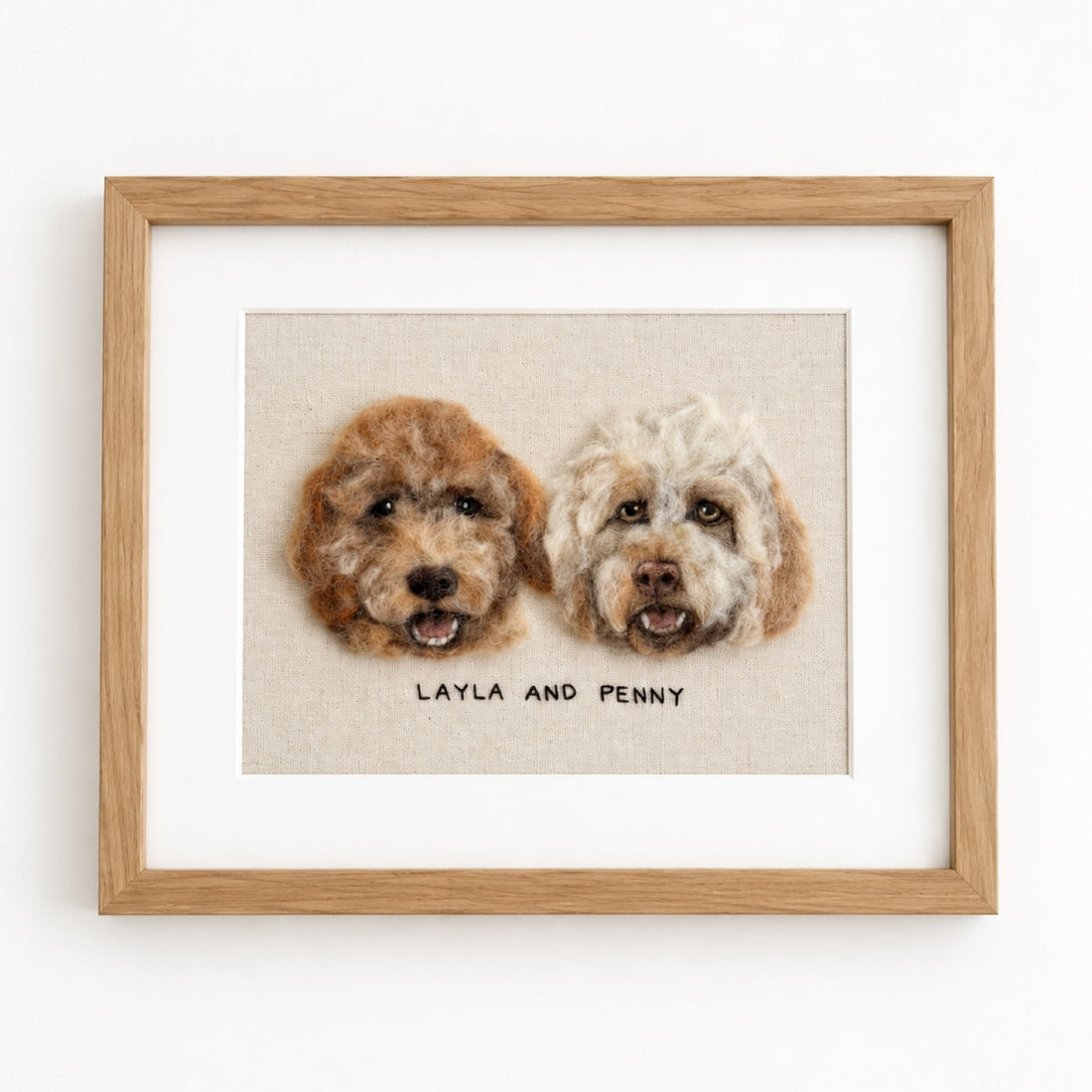 Product image of a rectangular custom wool felt pet portrait frame for one or two pets.