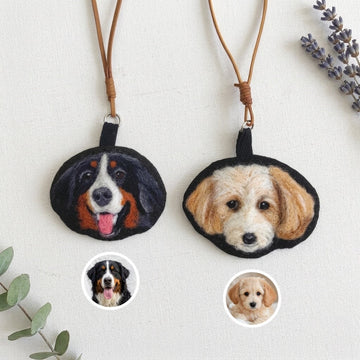 Product image of a needle felted pet keychain with a custom wool dog or cat portrait.