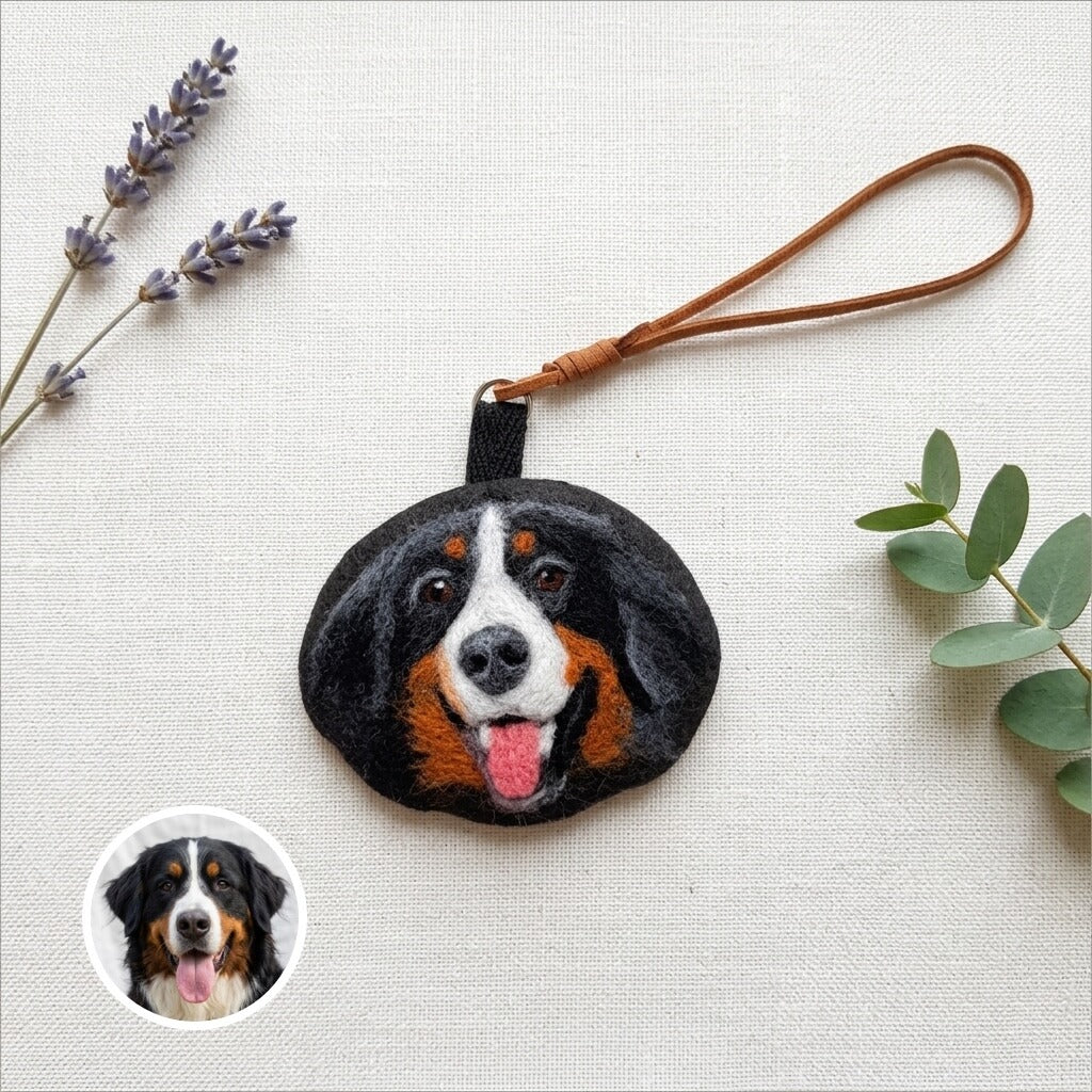 Product image of a needle felted pet keychain with a custom wool dog or cat portrait.