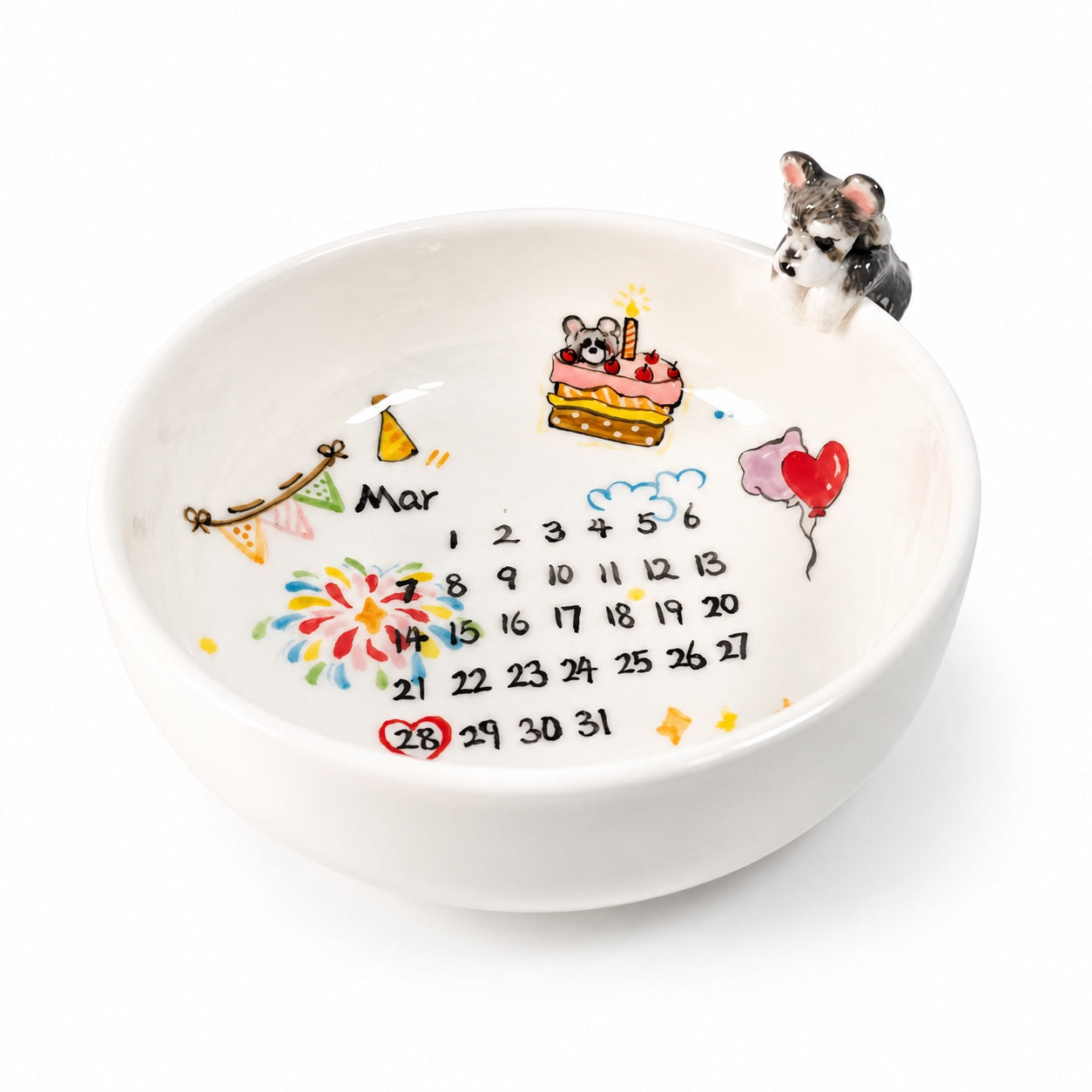 Product image of a personalized pet birthday bowl with a ceramic calendar design and 3D pet figurines.