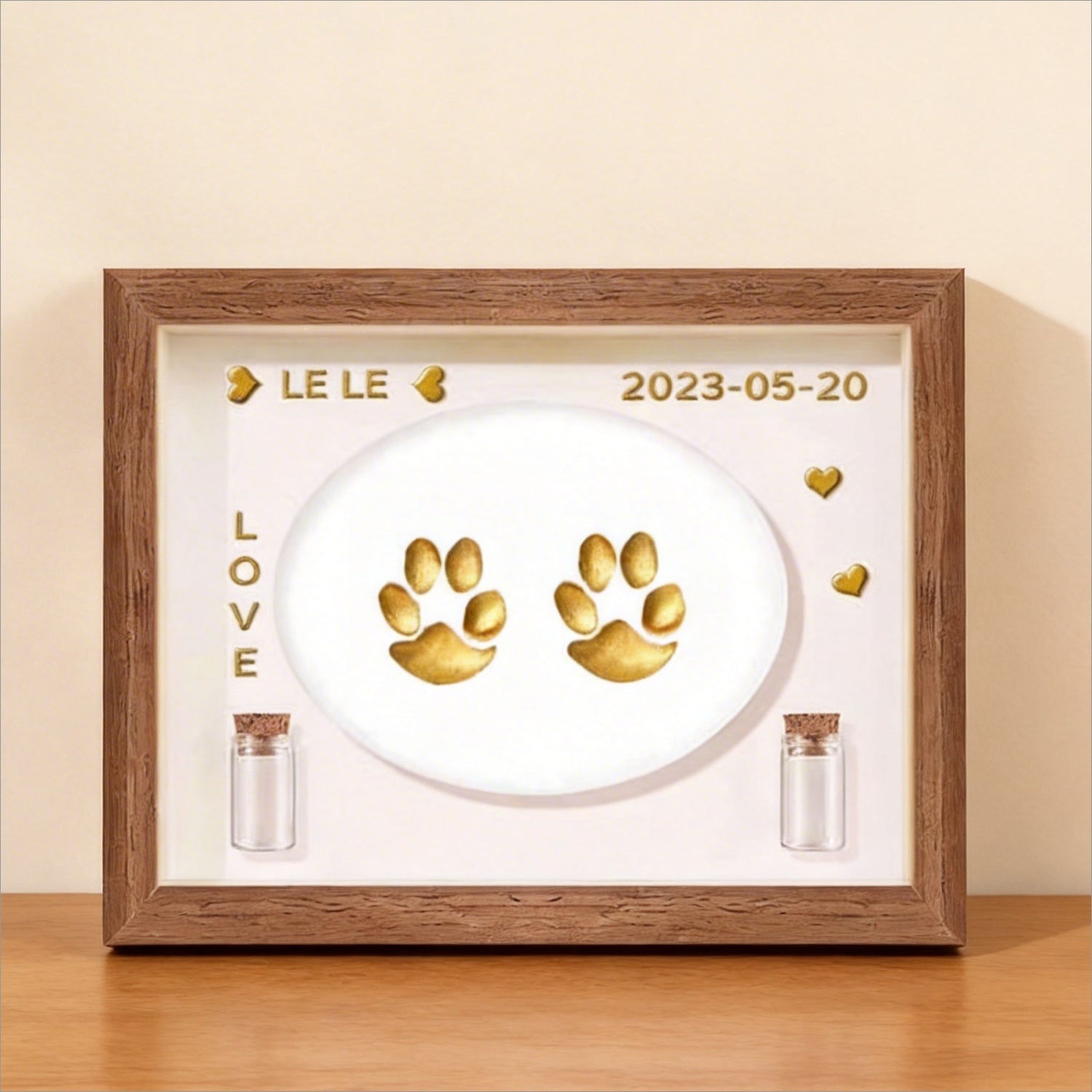 Product image of a personalized pet paw print frame for a dog's or cat's remembrance display.