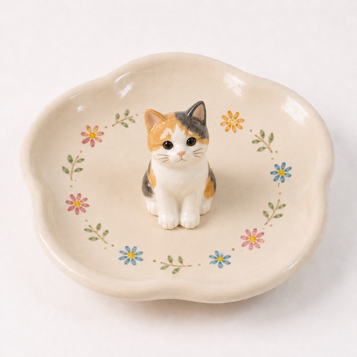 Product image of a custom pet figurine ring dish with a 3D dog or cat statue.