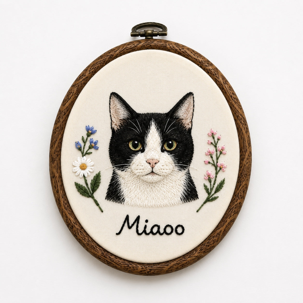 Product image of a round custom pet portrait embroidery frame for dog or cat wall art.