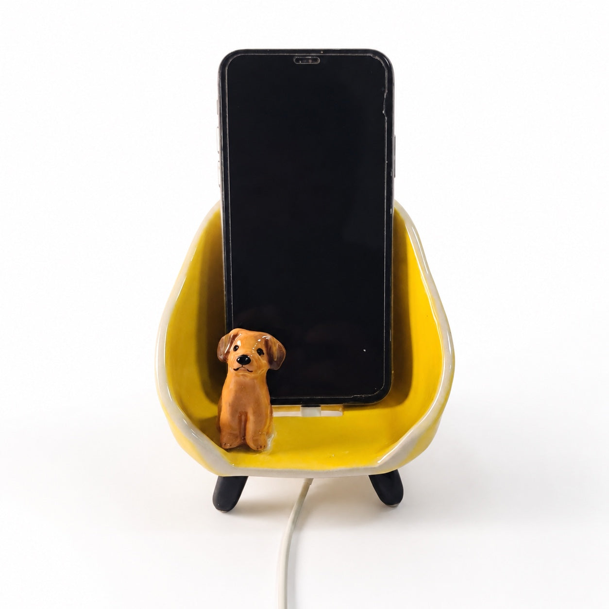 Product image of a custom pet phone stand with a personalized ceramic pet figurine.
