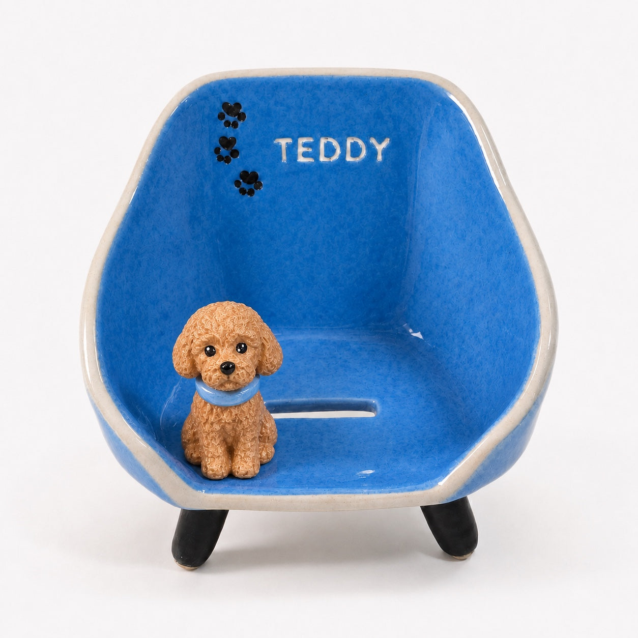 Product image of a custom pet phone stand with a personalized ceramic pet figurine.