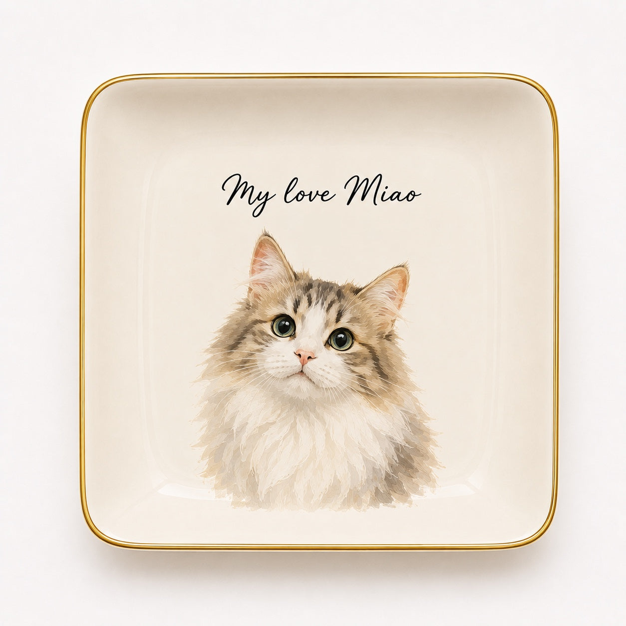 Product image of a custom pet portrait ceramic jewelry dish with a gold rim.