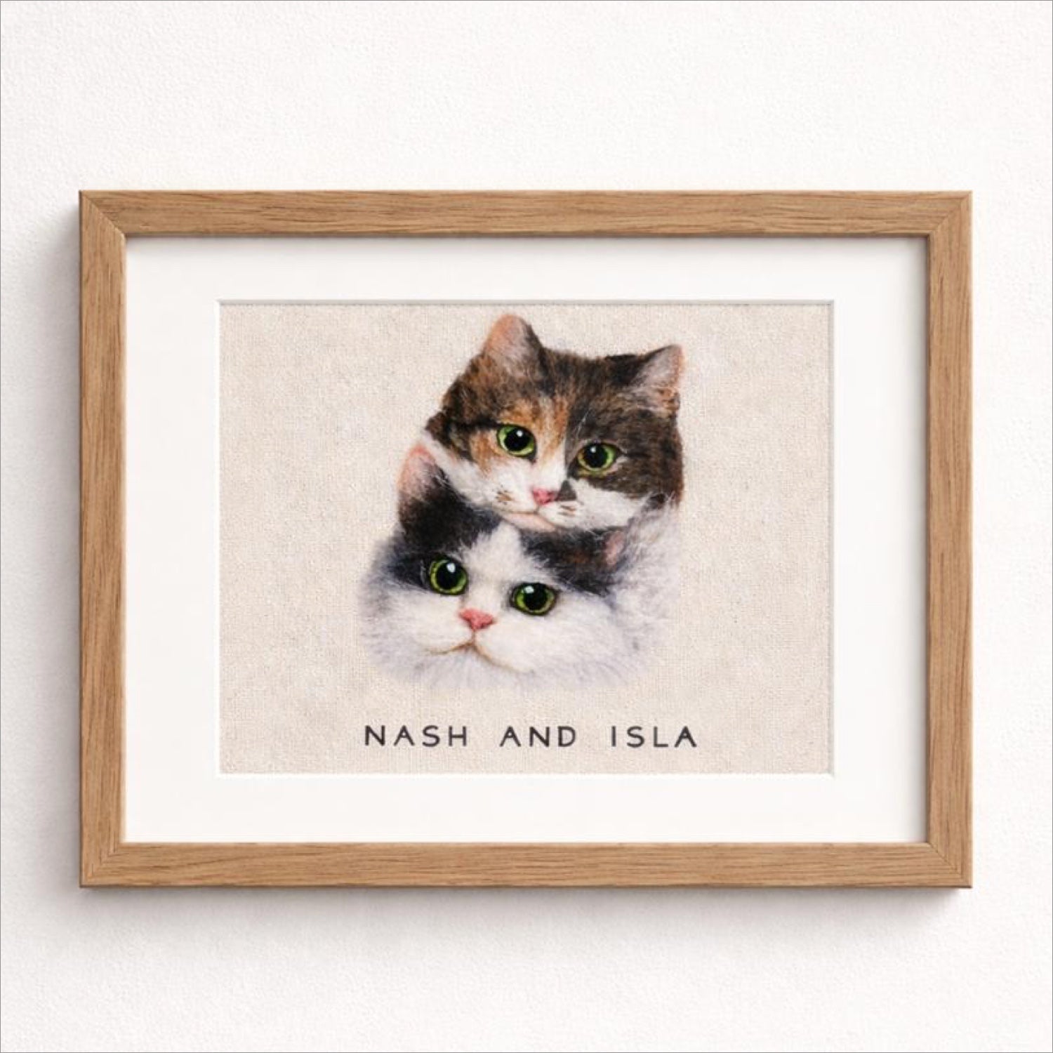 Product image of a rectangular custom wool felt pet portrait frame for one or two pets.