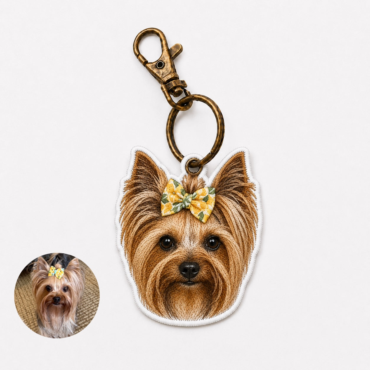 Product image of an embroidered pet portrait keychain with a tatami-style custom pet face.