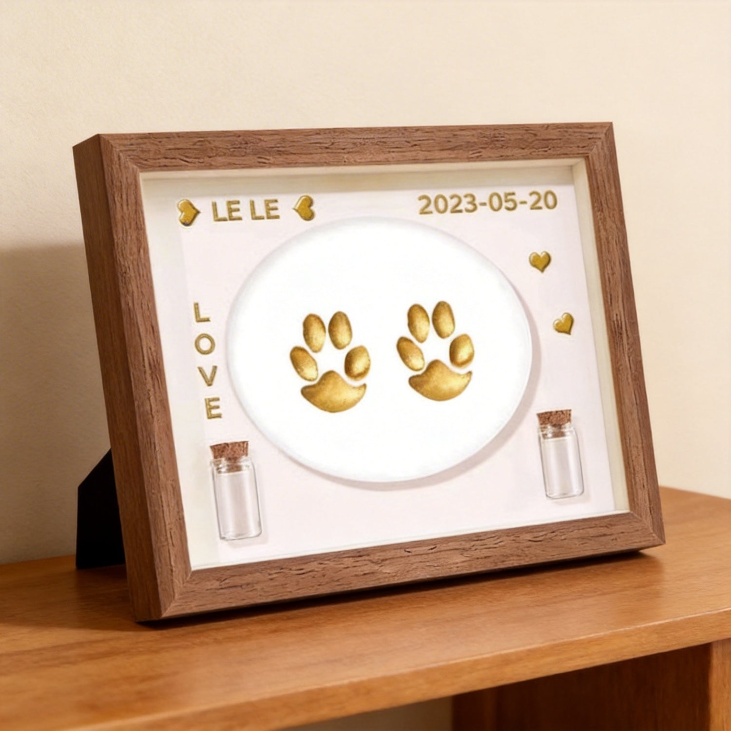 Product image of a personalized pet paw print frame for a dog's or cat's remembrance display.
