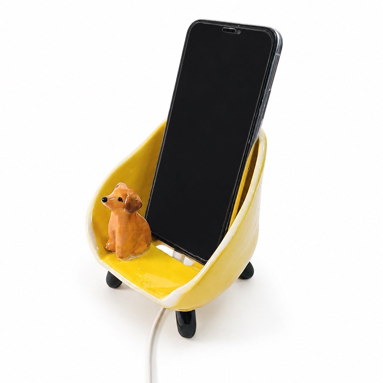 Product image of a custom pet phone stand with a personalized ceramic pet figurine.