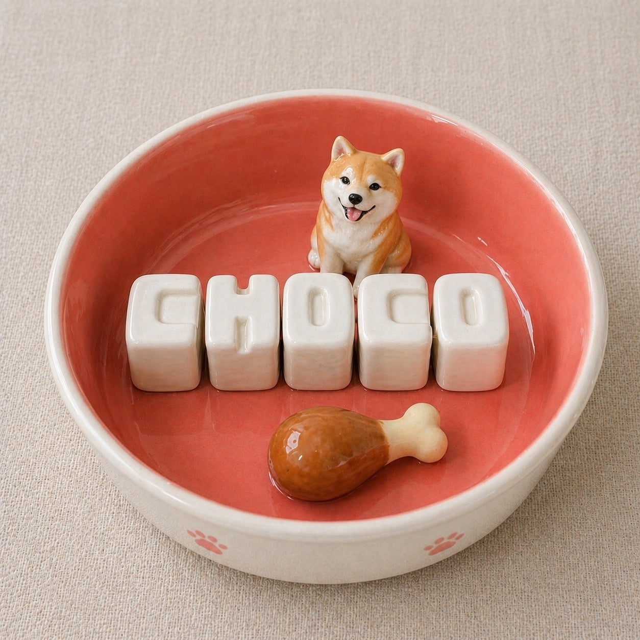 Product image of a custom name dog bowl with a personalized pet photo and ceramic feeding design.