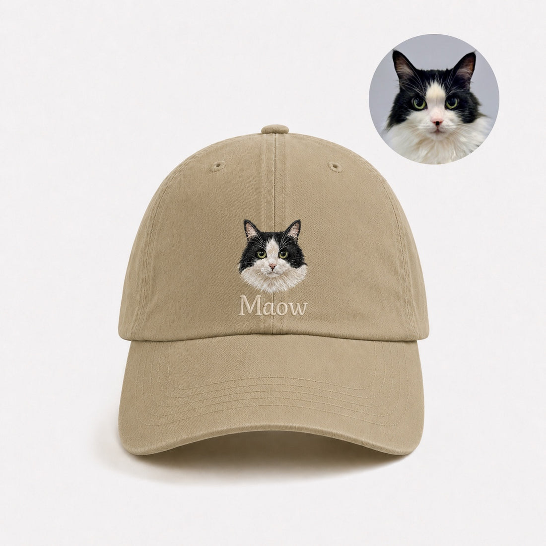 Custom pet portrait embroidered cap in navy with a white dog face and the personalized name Puppy.
