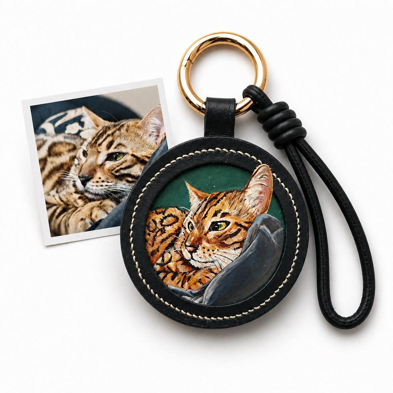 Product image of an embossed leather pet keychain with a custom dog or cat portrait.