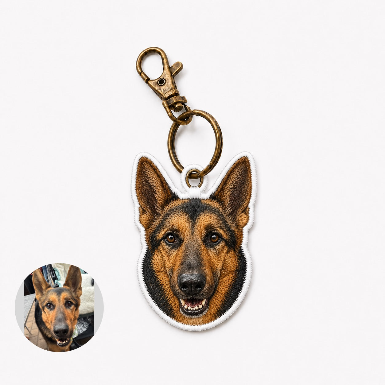 Product image of an embroidered pet portrait keychain with a tatami-style custom pet face.