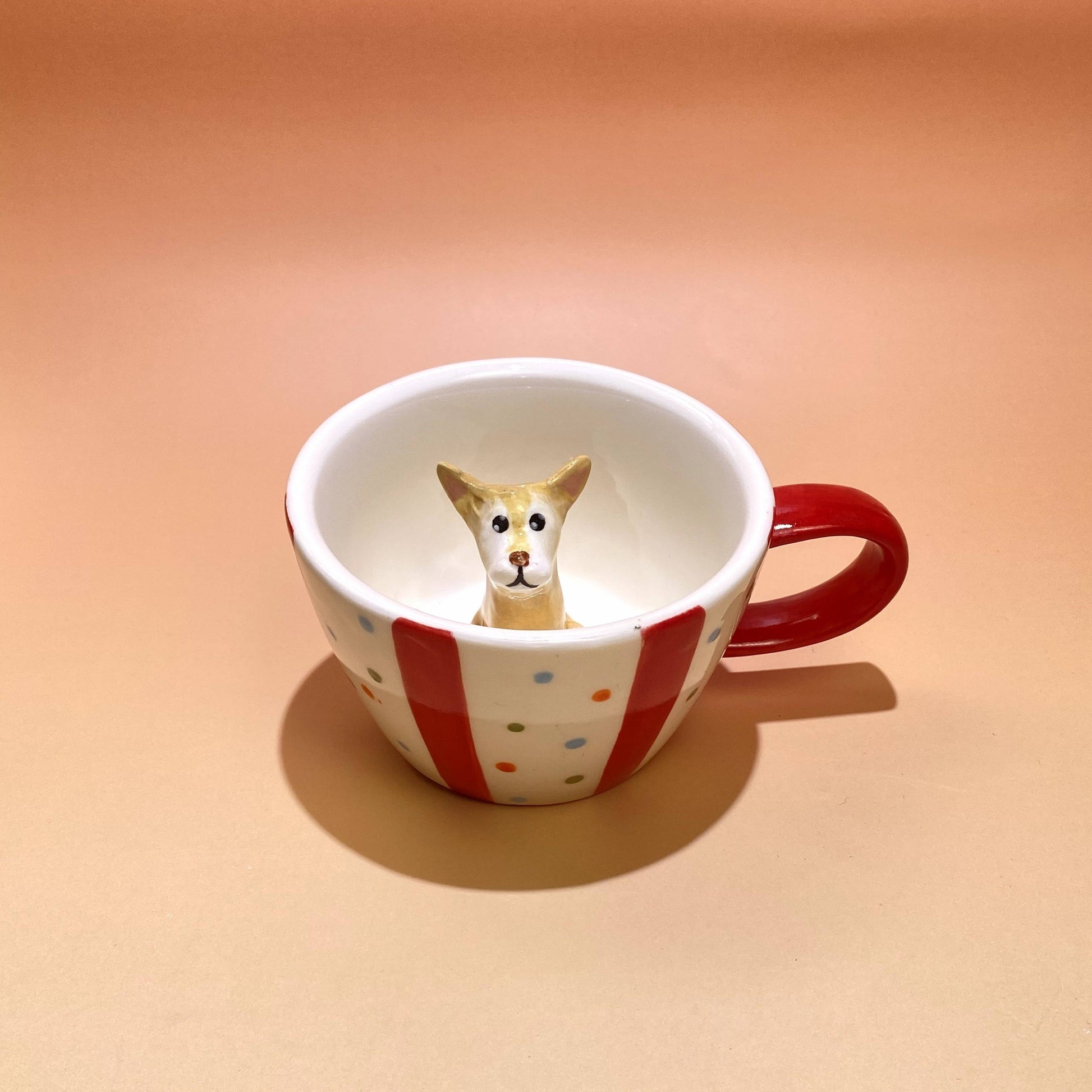 Product image of a 350 ml custom pet climbing mug with a handmade ceramic dog or cat figurine.