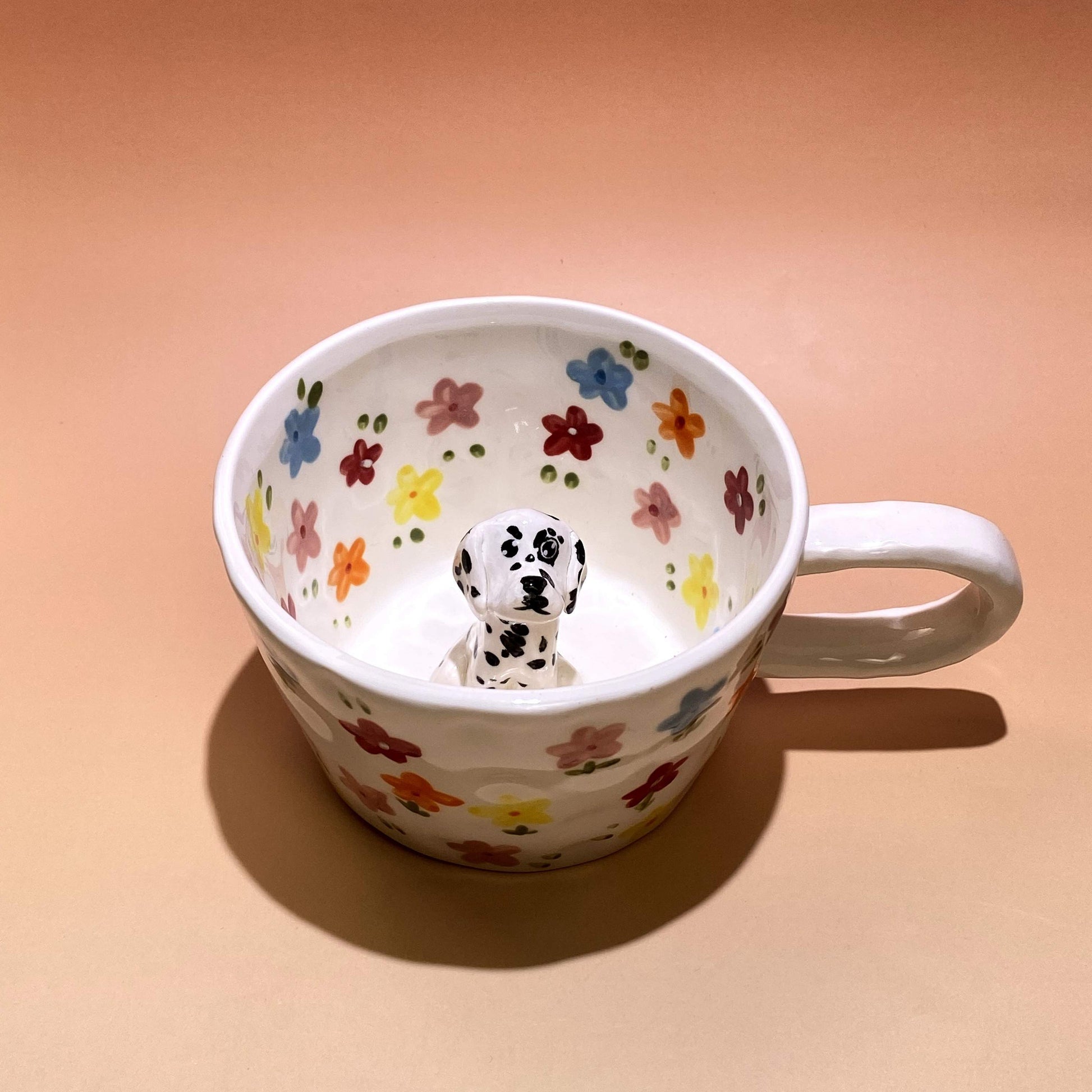 Product image of a 350 ml custom pet climbing mug with a handmade ceramic dog or cat figurine.