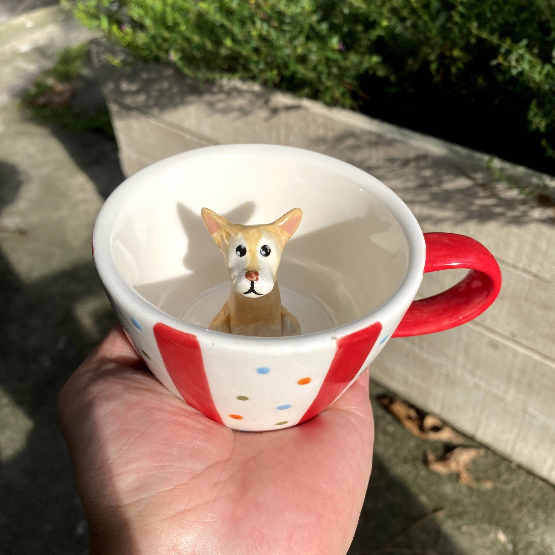 Product image of a 350 ml custom pet climbing mug with a handmade ceramic dog or cat figurine.