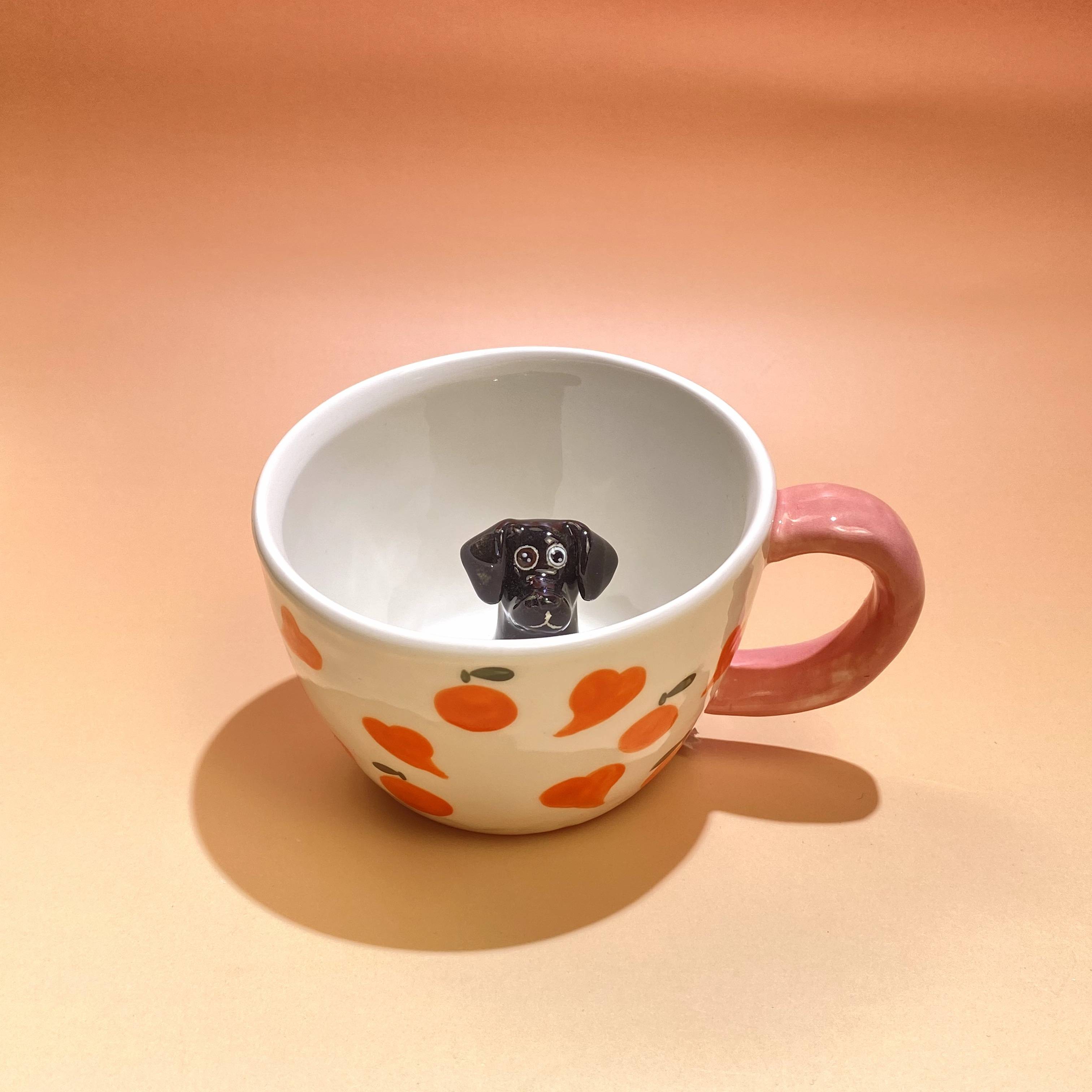 Product image of a 350 ml custom pet climbing mug with a handmade ceramic dog or cat figurine.