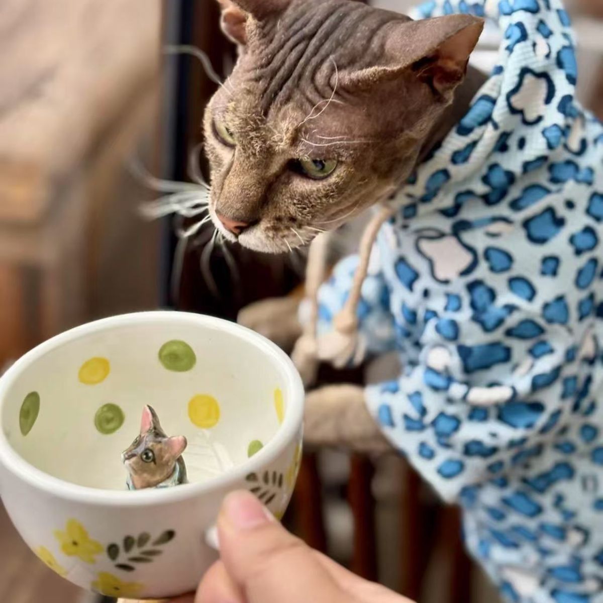 Product image of a 350 ml custom pet climbing mug with a handmade ceramic dog or cat figurine.