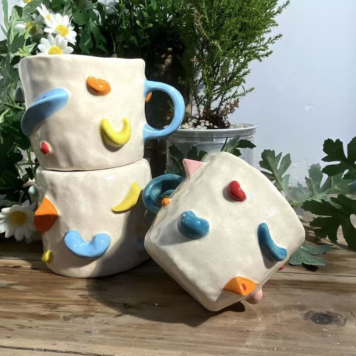 Product image of a 350 ml custom pet climbing mug with a handmade ceramic dog or cat figurine.