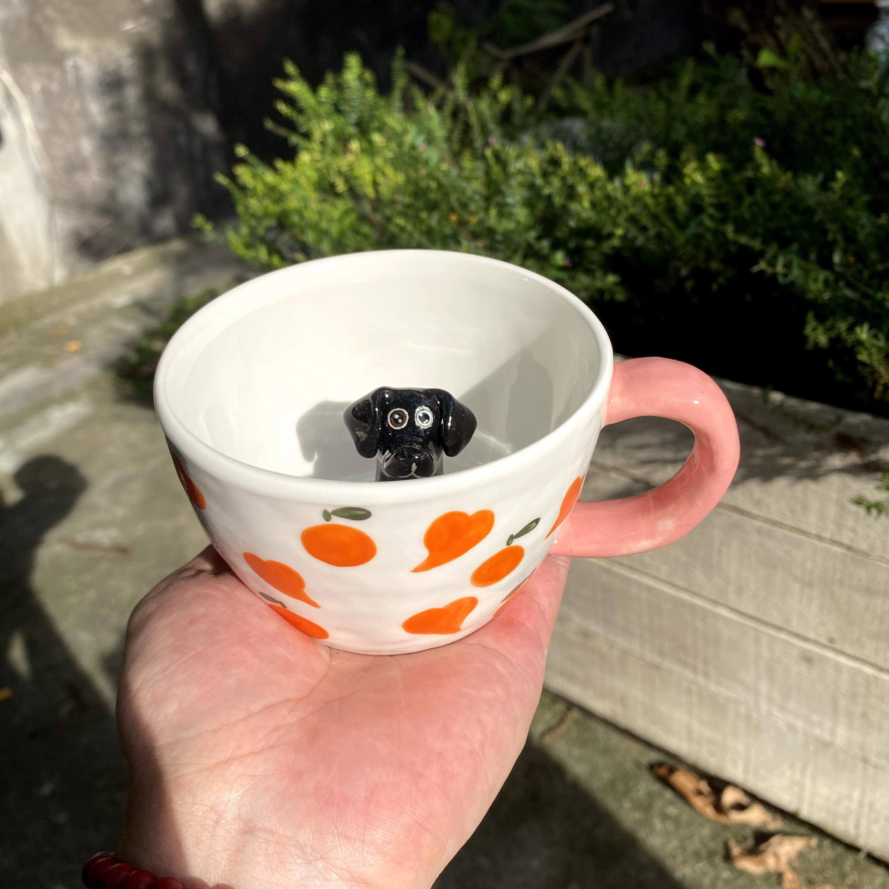 Product image of a 350 ml custom pet climbing mug with a handmade ceramic dog or cat figurine.