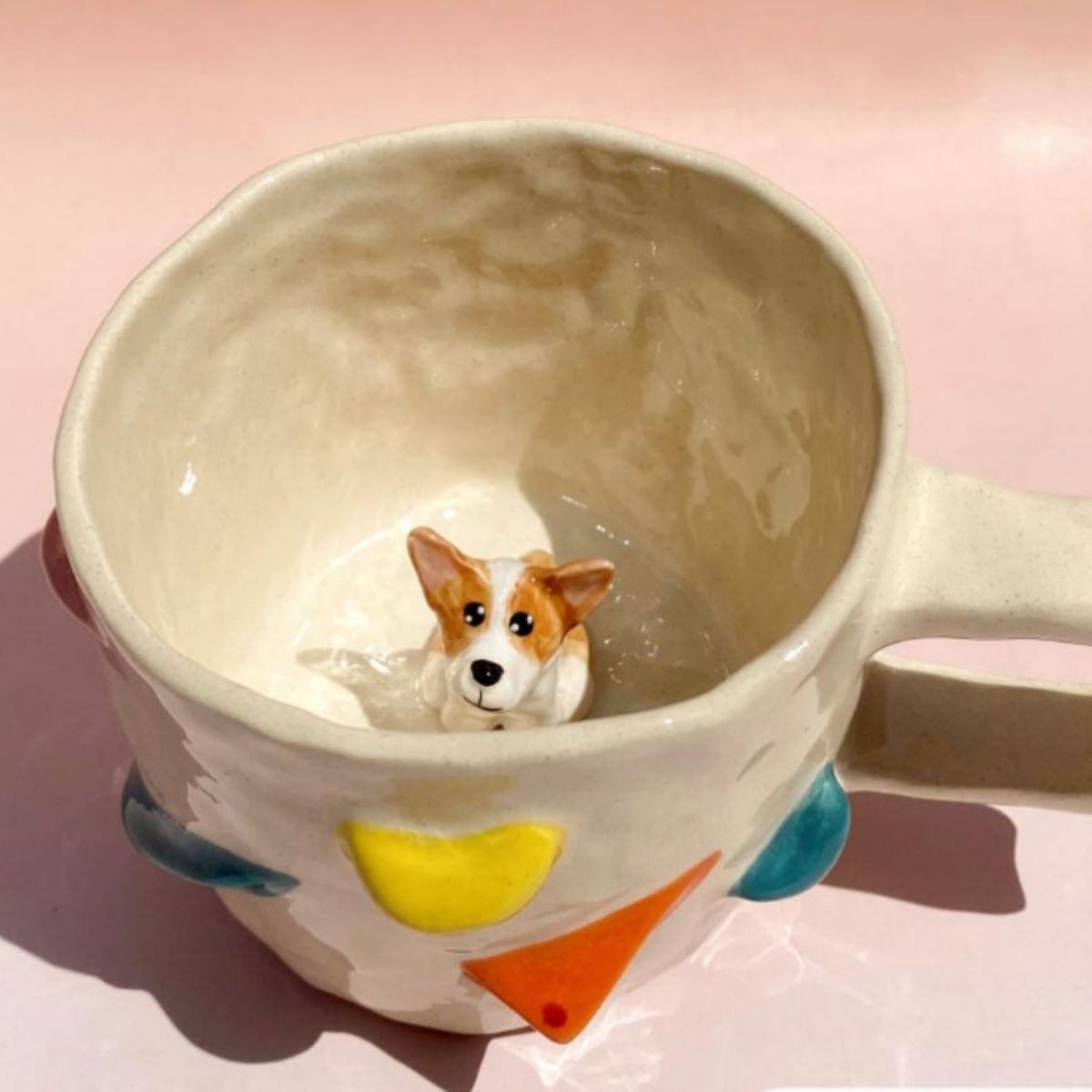 Product image of a 350 ml custom pet climbing mug with a handmade ceramic dog or cat figurine.