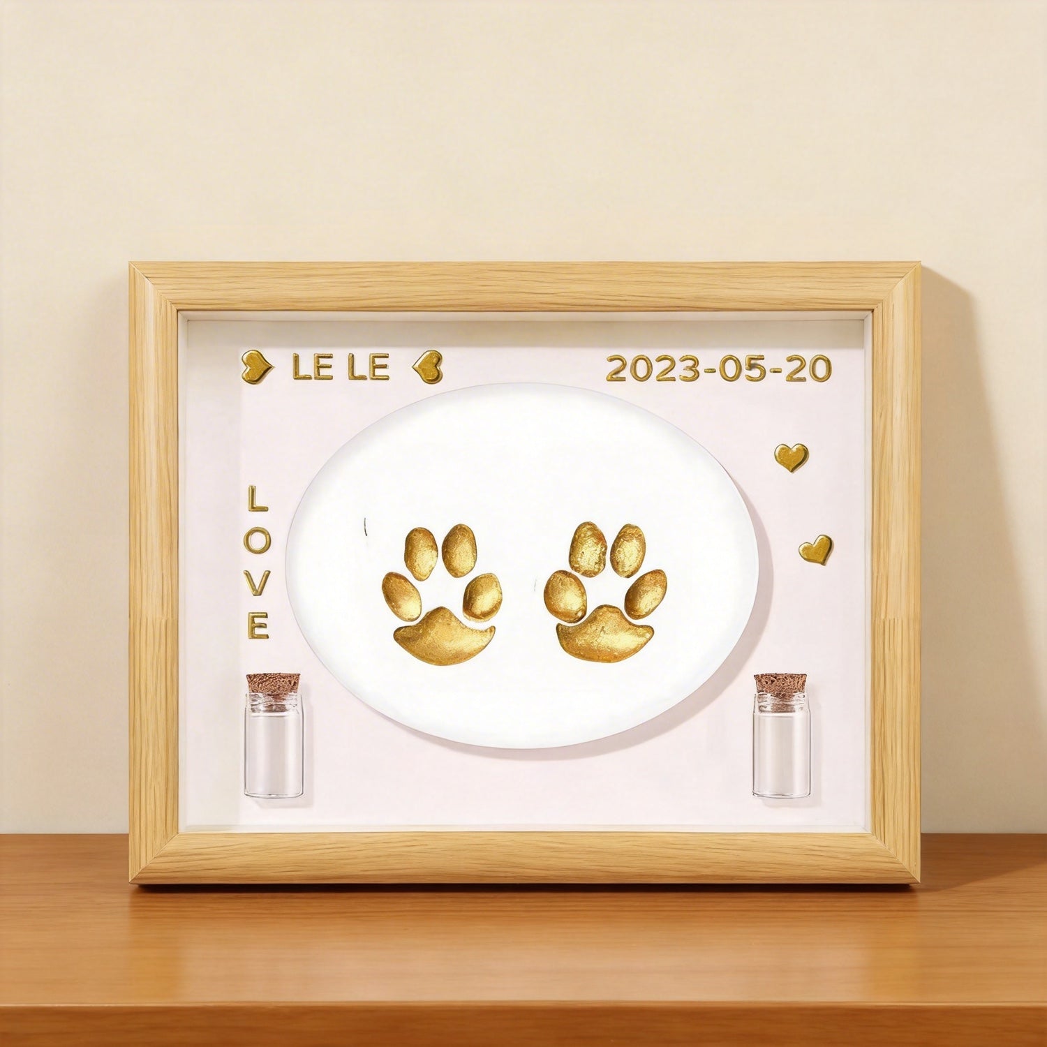 Product image of a personalized pet paw print frame for a dog's or cat's remembrance display.