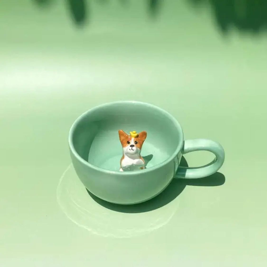 Top view of a personalized mug showing the 3D pet figure inside.