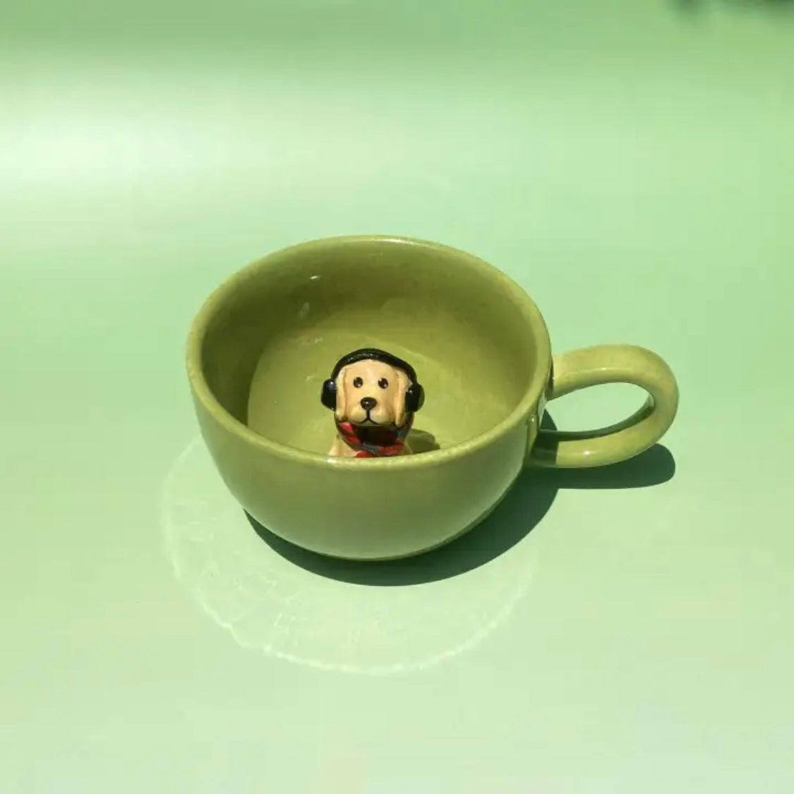 Custom ceramic mug showing an example with two 3D pet figures inside.