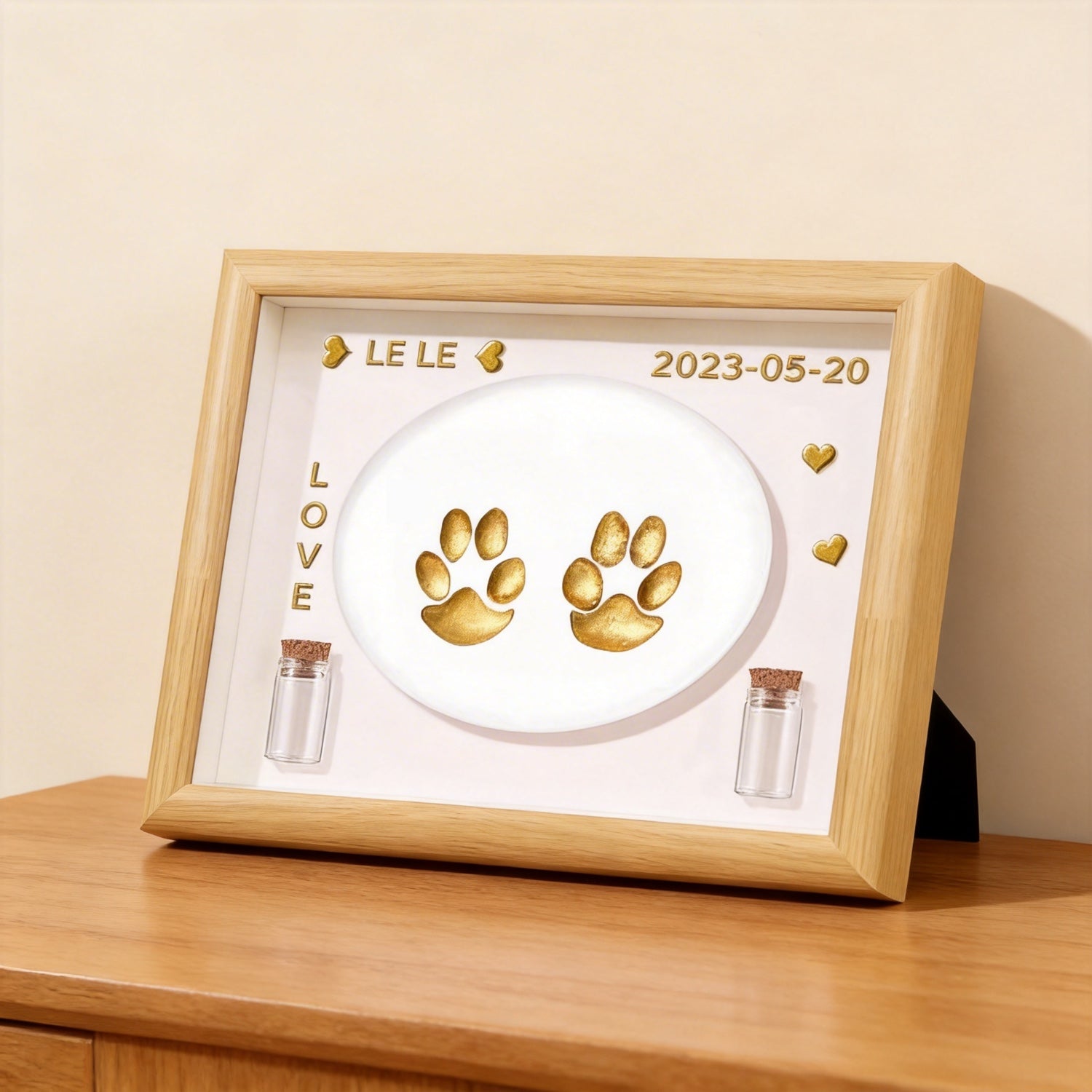 Product image of a personalized pet paw print frame for a dog's or cat's remembrance display.