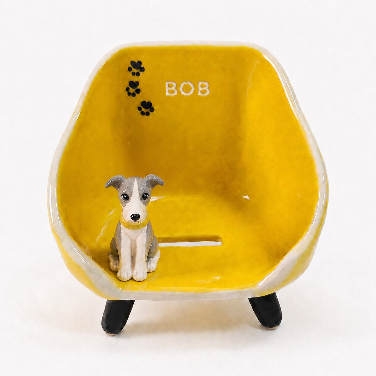 Product image of a custom pet phone stand with a personalized ceramic pet figurine.