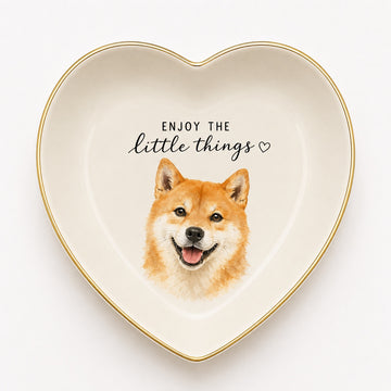 Product image of a custom pet portrait ceramic jewelry dish with a gold rim.