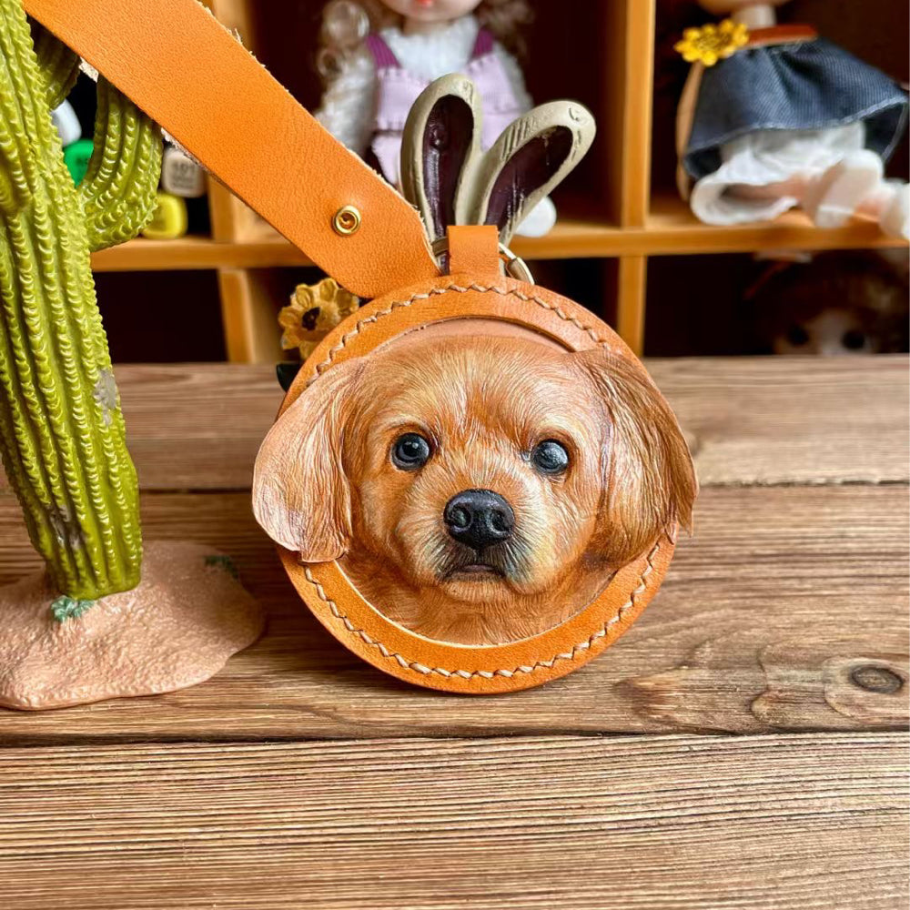 Custom leather pet portrait keychain shown in different leather colors.