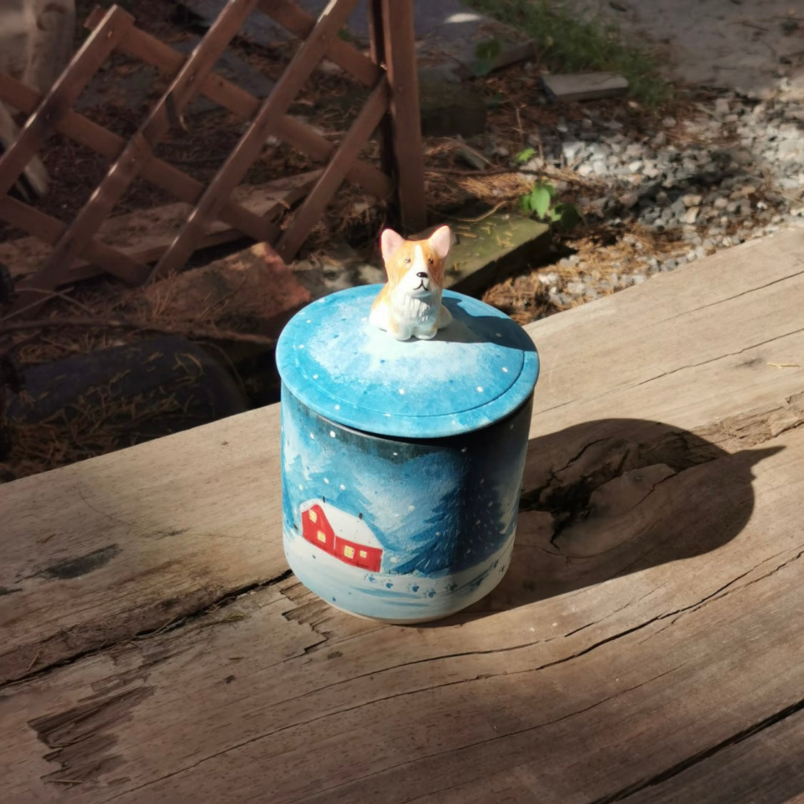 Detail of the hand-painted ceramic surface on a pet urn for ashes.