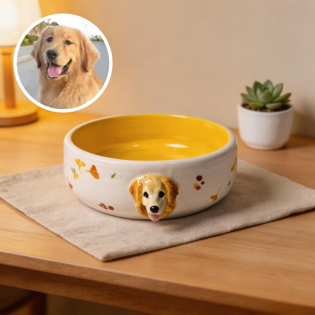 Front view of a ceramic pet bowl with a raised custom 3D pet head on the rim.