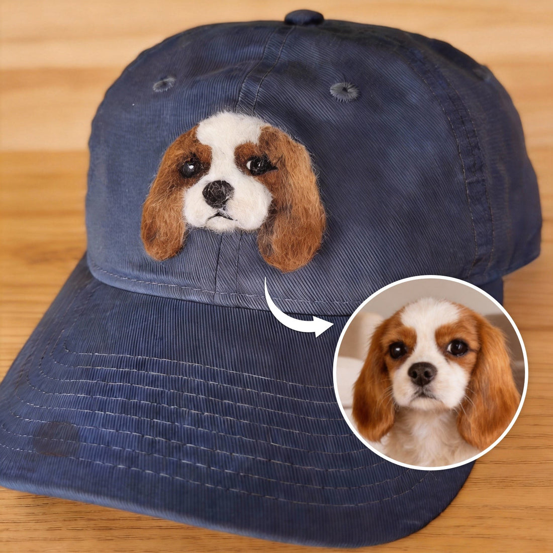 Front view of a baseball cap with a handmade wool felt custom pet portrait.